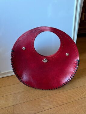 Round Red Leather Handbag with Contrast Stitching